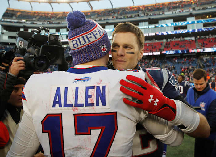 Dec 23, 2018; Foxborough, MA, USA; New England Patriots quarterback Tom Brady (12) meets Buffalo Bills quarterback Josh Allen (17) after the game at Gillette Stadium. Patriots defeated the Bills 24-12.